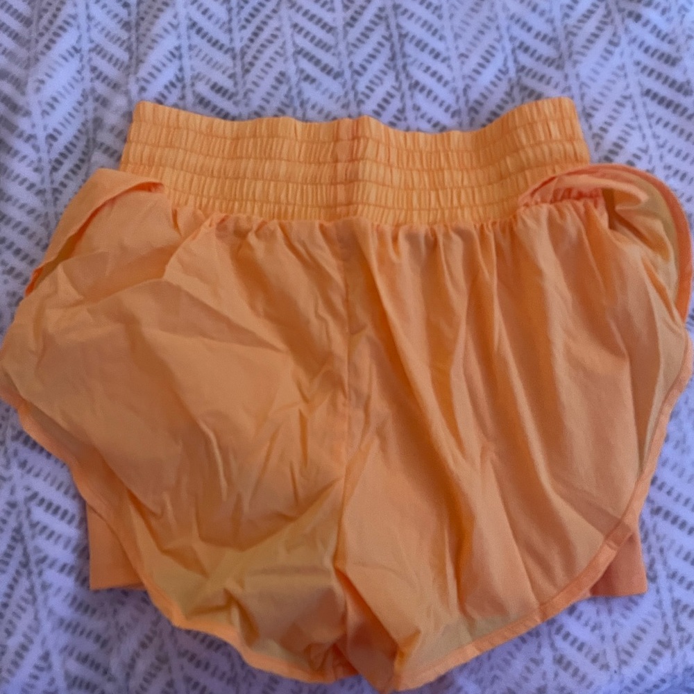 Neon orange shorts